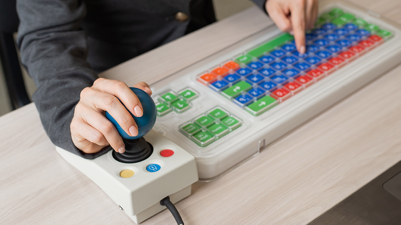 Image of a student using an assistive technology style keyboard